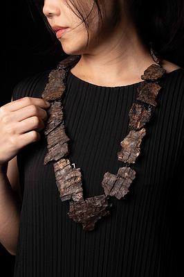 2025_10_Scab_necklace_bark_wearing